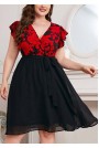 Женствена макси рокля в черно с червени цветя