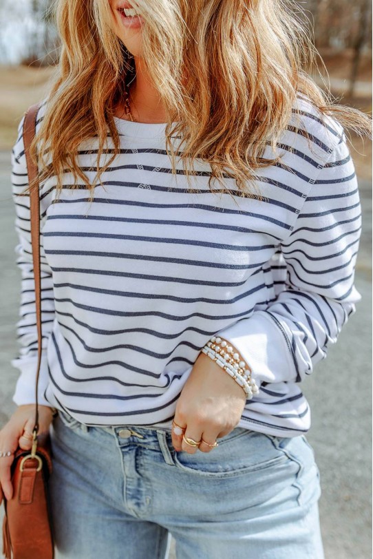 White plus size blouse with long sleeves and blue stripe