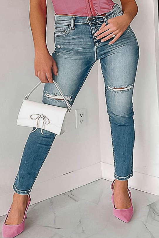 Clean plus size jeans with white stitching and two slits