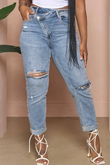 Light modern plus size jeans with a slight rip and diagonal zip