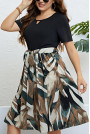 Elegant plus size dress with a cut-out skirt