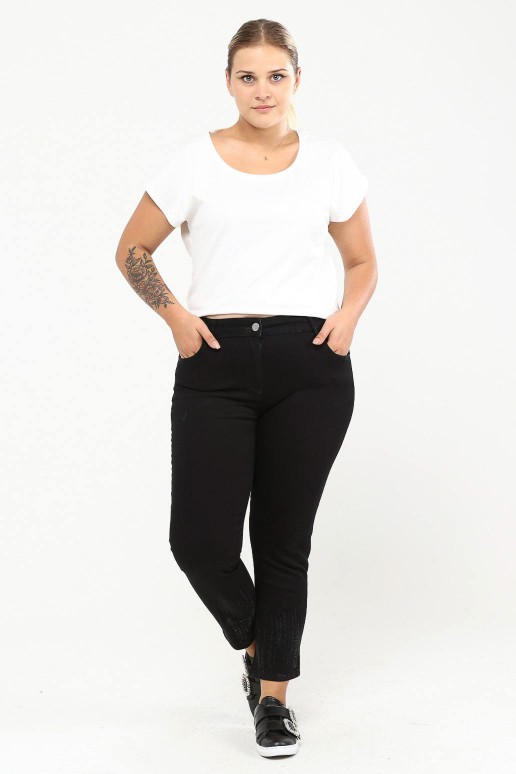 Skinny plus size black jeans with fine stones at the end of the legs