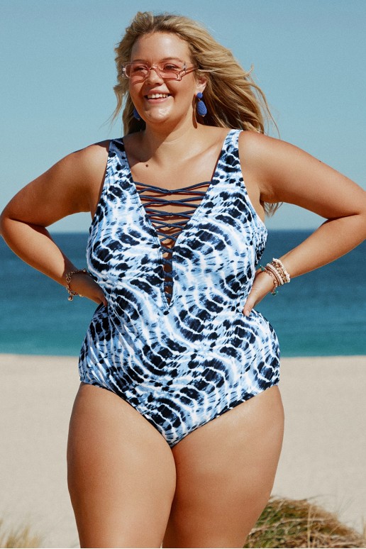 One piece plus size swimsuit with ties at the neckline and fresh blue print
