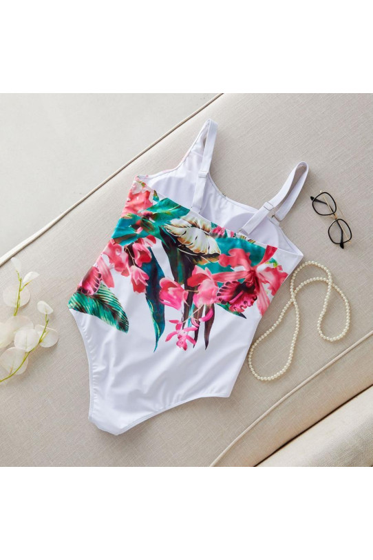 Stylish white plus size swimsuit with a floral print