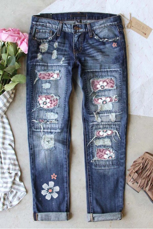 Jeans with dark pink inner patches and flower print