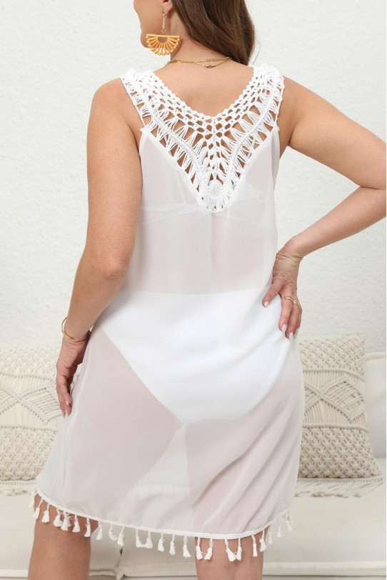 Stylish white beach dress with knitted details