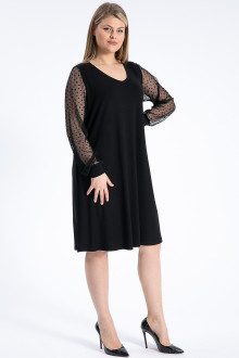 Luxurious black plus size dress with ethereal polka dot sleeves