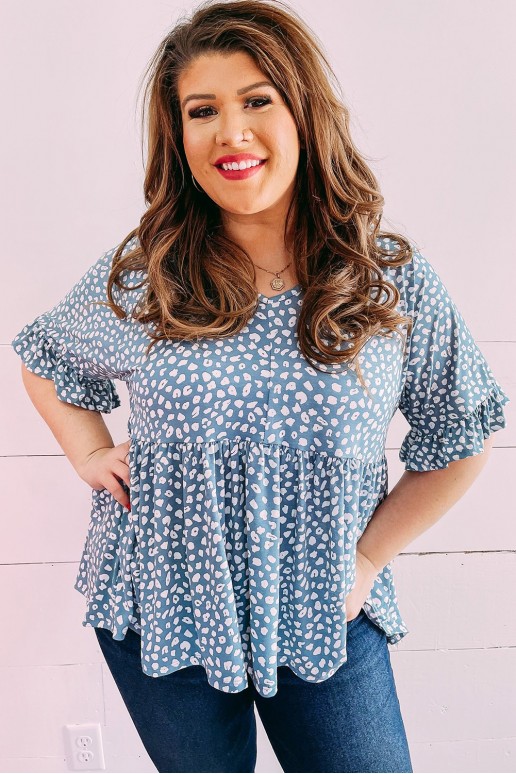 Plus size top with 3/4 sleeves in blue