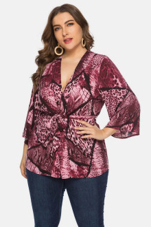 Plus size kimono blouse in pink-purple animal prints