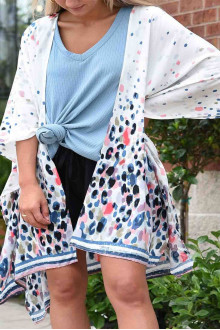 An ethereal maxi kimono with a print of colored dots