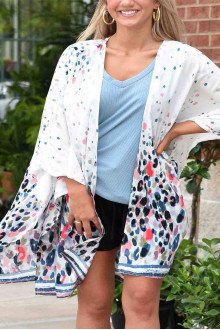 An ethereal maxi kimono with a print of colored dots