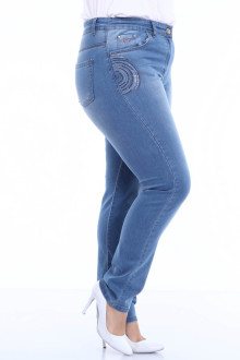 Light jeans with decoration on the pockets