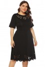 Black plus size dress with short sleeves and laser cut petals