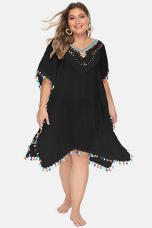 Summer lace cardigan in whiteBeach dress in black with bright embroidery and tassels