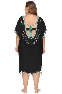 Summer lace cardigan in whiteBeach dress in black with bright embroidery and tassels