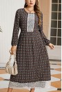 Long plus size dress with embroidery and print in earthy brown tones