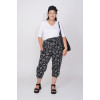 Short loose trousers with designer black and white print