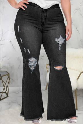 Black plus size Charleston jeans with a slight rip