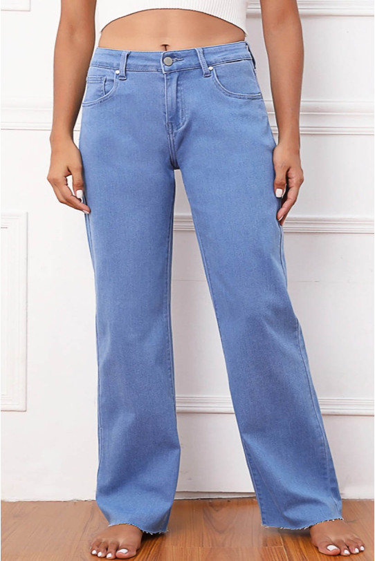 Loose light plus size jeans with unhemmed legs