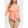 Tankini with peach top and floral shorts