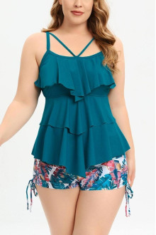 Plus size tankini with turquoise top and floral shorts