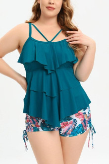 Plus size tankini with turquoise top and floral shorts