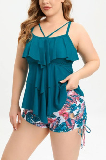 Plus size tankini with turquoise top and floral shorts