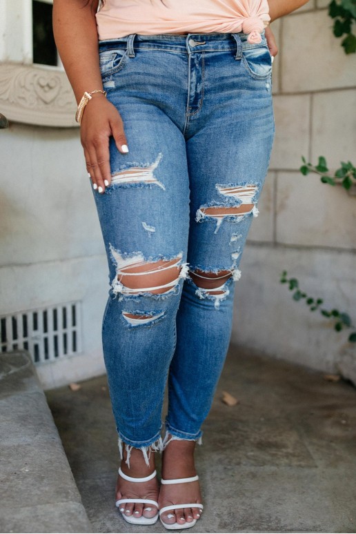 Plus size jeans with torn hips