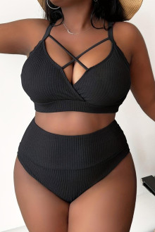 Fashionable black plus size half swimsuit with ties at the neckline