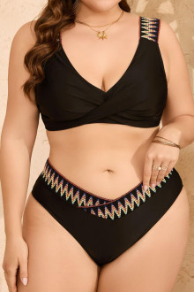 Black swimsuit with twisted neckline and ethnic motifs