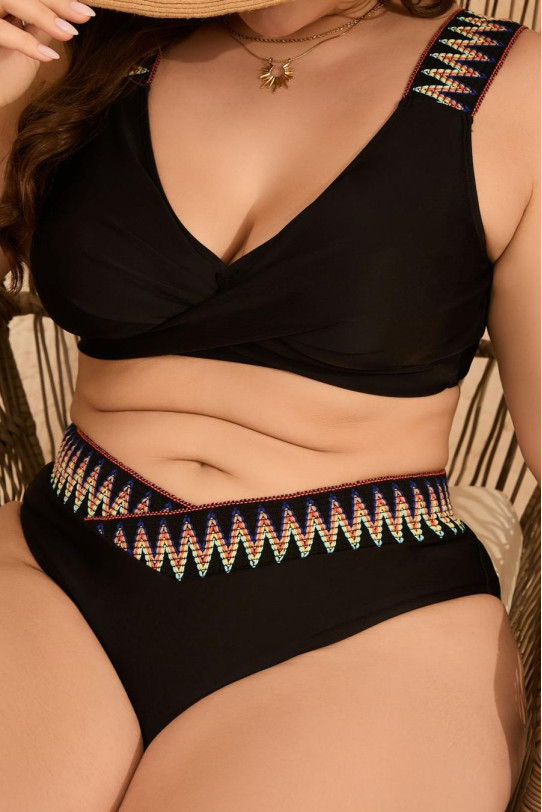 Black swimsuit with twisted neckline and ethnic motifs