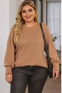 Brown plus size blouse in textured fabric with fine braid