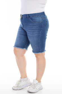 Short summer jeans with disheveled legs