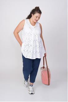 White sleeveless blouse with openwork fine braid