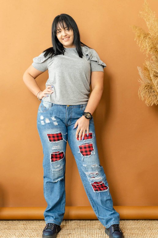Makes plus size jeans with plaid patches