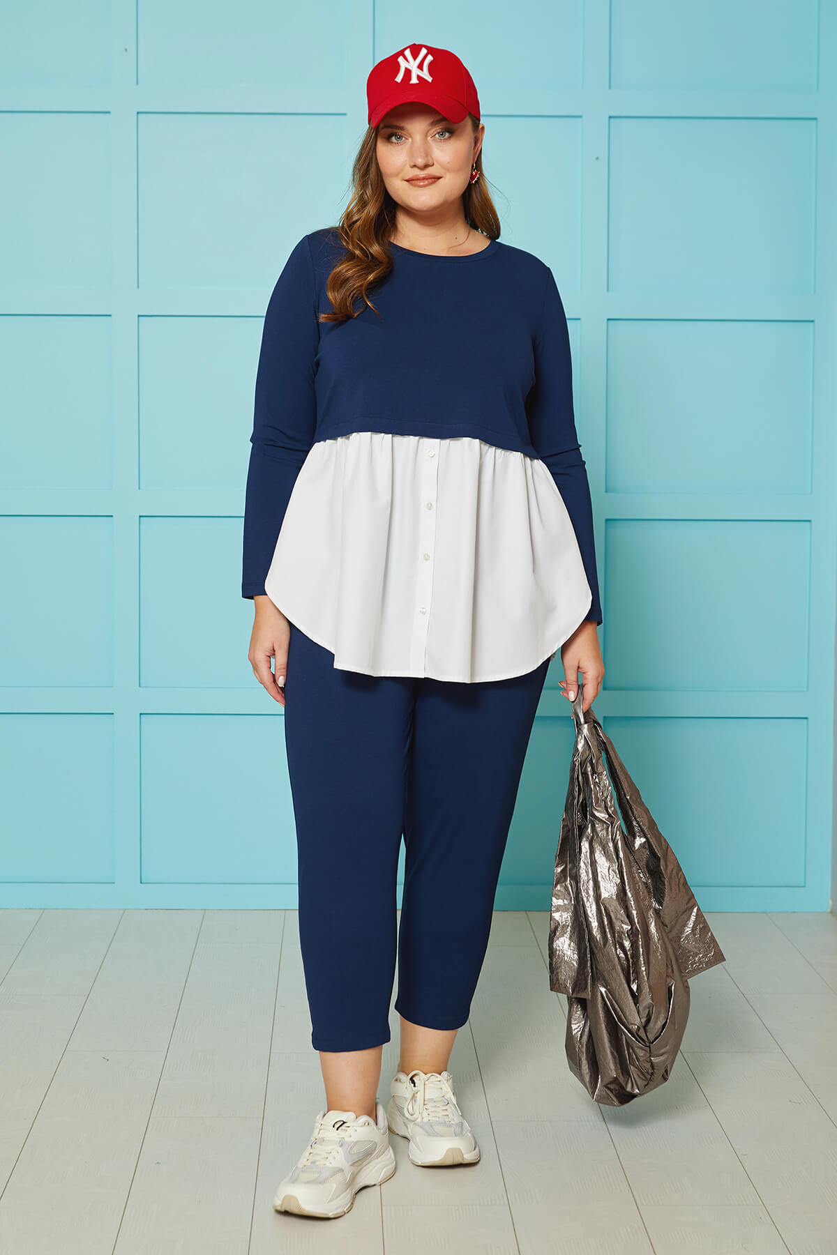 Stylish set of dark blue blouse and trousers